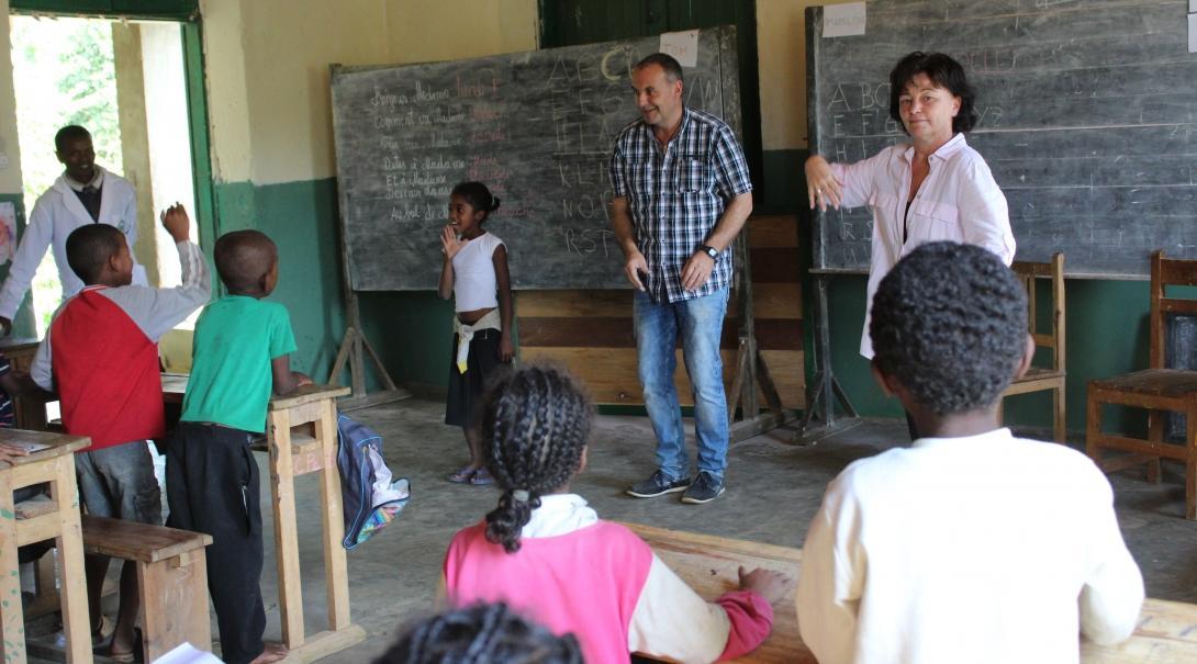 Projects Abroad volunteers sing songs with their students while they volunteer teaching English in Madagascar Older volunteer run a sing along class with the students at our volunteer teaching placements in Madagascar